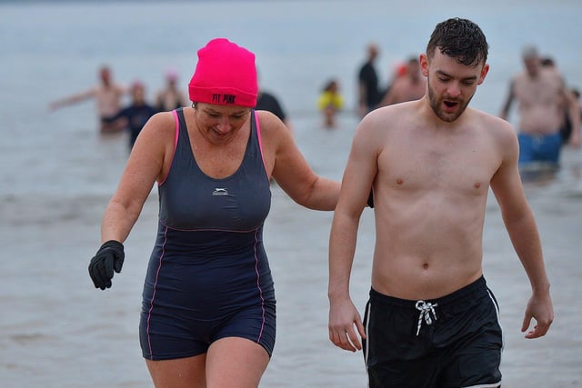 Some of the swimmers taking part in the annual ARC Fitness New Years Day Charity Swim at Lisfannon beach.  Photo: George Sweeney. DER2301GS  11
