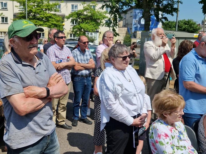 Family members and friends of the victims at the mural launch.