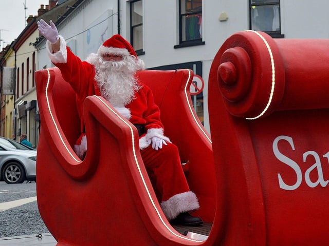 Santa arrives at Foyleside Shopping Centre on Saturday morning. Photo: George Sweeney. DER2244GS – 60