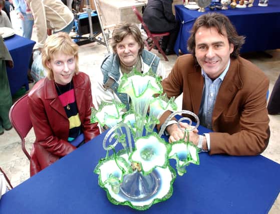 Flog It! presenter Paul Martin with local people at the Millennium Forum.