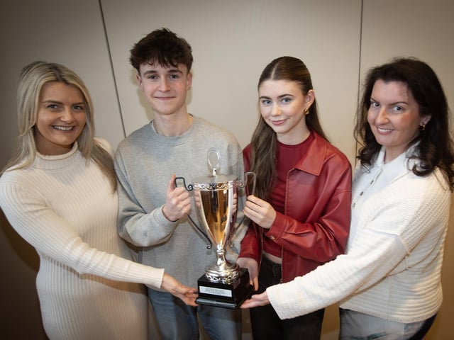 Councillor Caitlin Deeney and Blathnaid Biddle, teacher, Foyle School of Speech and Drama, presenting the Global Mercy United Nations Award to Kayla McCallion and Eoin Wilson at the Guildhall on Tuesday. (Photos: Jim McCafferty Photography)