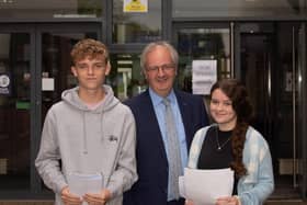 Oakgrove Principal Mr. John Harkin pictured with some of this GCSE students on Thursday.