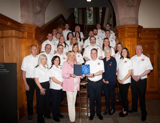 FSR AT GUILDHALL. . . . .The Mayor of Derry City and Strabane District Council, Sandra Duffy making a presentation to Stephen Twells and the staff of the  Foyle Search and Rescue at a function in the Guildhall on Wednesday evening to mark their 30th anniversary. (Photos: Jim McCafferty Photography)