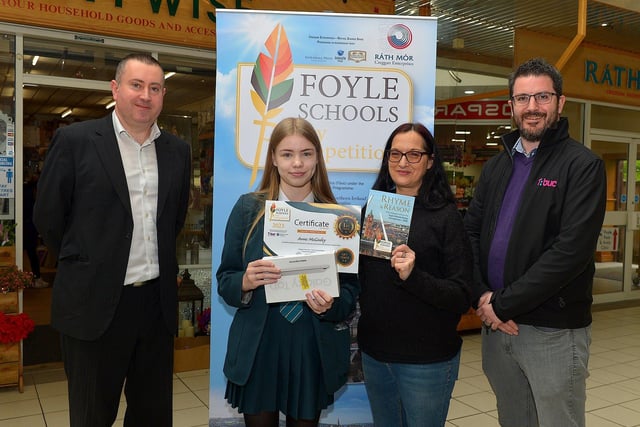 Thornhill College pupil, Anne McGinley was awarded First Place in the KS4 My Community category in the inaugural Foyle Schools Poetry Competition. Included in the photograph are Kevin Hippsley, manager of Creggan Enterprises, Jenni Doherty, Little Acorn Bookstore and Michael Withers, NI Executive Office (funder). Photo: George Sweeney.  DER2313GS – 43
