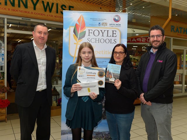 Thornhill College pupil, Anne McGinley was awarded First Place in the KS4 My Community category in the inaugural Foyle Schools Poetry Competition. Included in the photograph are Kevin Hippsley, manager of Creggan Enterprises, Jenni Doherty, Little Acorn Bookstore and Michael Withers, NI Executive Office (funder). Photo: George Sweeney.  DER2313GS – 43