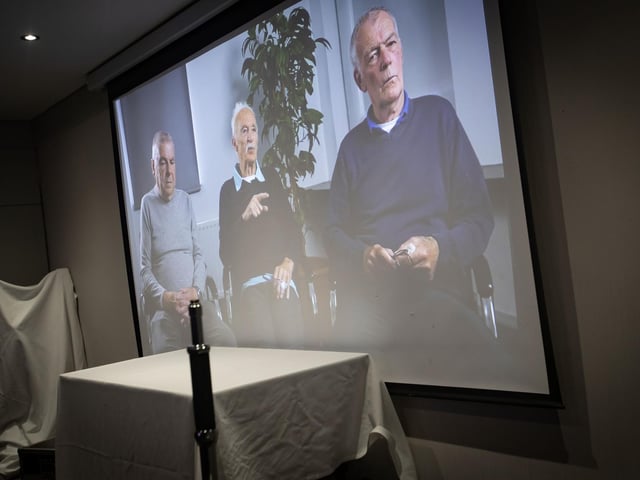 THE THREE MUSKETEERS!. . . .Nucker Tierney, Tony O'Doherty and Gerry Duddy recalling their memories of the Creggan Neighbourhood Partnership on video during Saturday night's celebrations.  : .