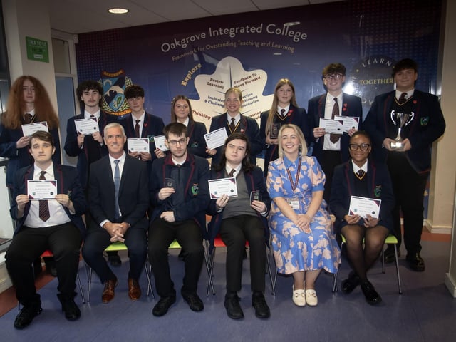 Oakgrove Ingtegrated College Year 13 curriculum award winners pictured with Mr Colin Donaghey Head of Year and Mrs Kellie-Marie Martin, Vice Principal.