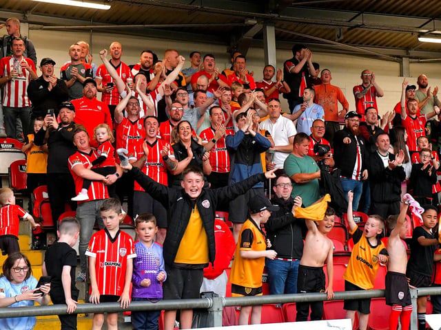Derry City fans celebrate Will Patching’s winning goal against against Sligo Rovers on Friday evening. Photo: George Sweeney. DER2327GS – 075