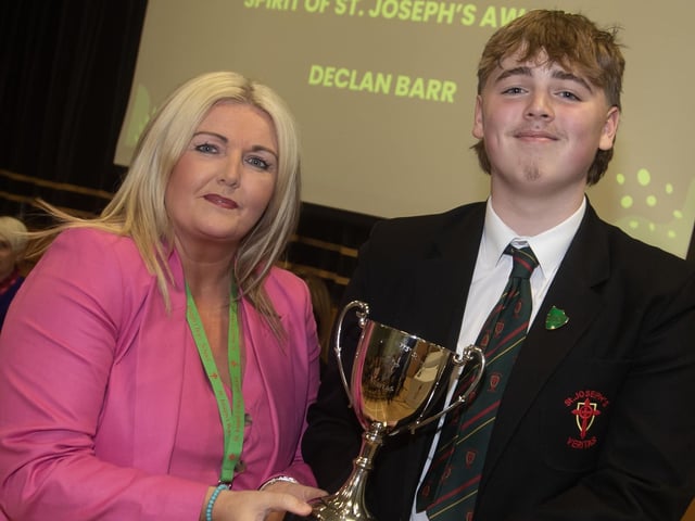 Mrs Ciara Deane, Principal, presents the Spirit of St. Joseph's Award to the shool's new Head Boy Declan Barr, during Senior Prizegiving. (Photos: Jim McCafferty Photography) : .