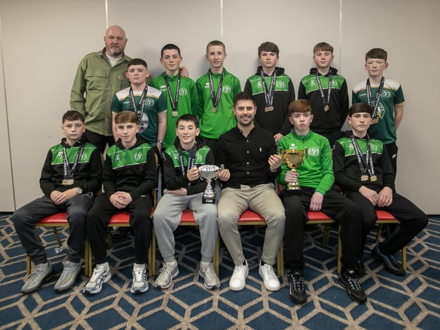 Special guest Stephen McKendry presenting Foyle Harps u-13s with their trophies at the Annual D&D Youth FA awards on Friday night. Included is coach Damien Doherty. (Photos: Jim McCafferty Photography)
