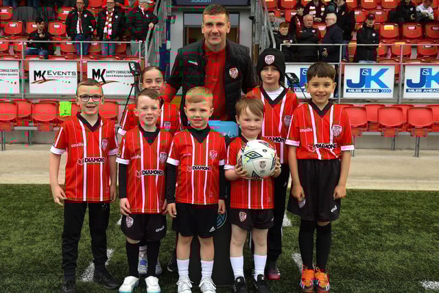 Mascots pictured with team captain Patrick McEleney before the game against UCD on Friday evening last. Photo: George Sweeney. DER2320GS – 133
