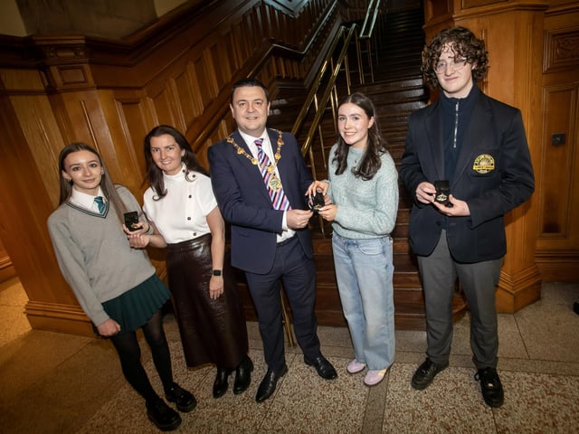 Pupils awarded with Gold Medal for Final Grade, Ella Connolly, Eve Ellen McElwee and Alfie McAllister, pictured with the Mayor, Ruairi McHugh and Blathnaid Biddle.