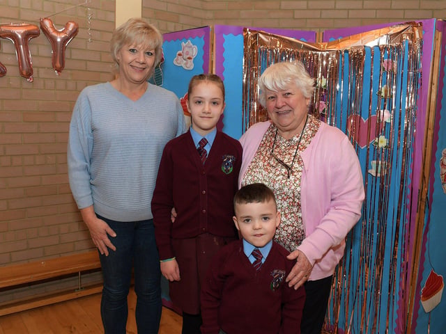 Granny Clark and great granny Mary Ryan with Isla and Darragh at St John’s PS Grandparents Vintage Tea. Photo: George Sweeney