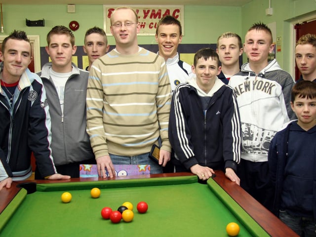 Members of the Ballymagroarty Youth Club, Davy, Robby, Eamon, Mullan, Michael, Diver, Niall, Ruari and Blane have a last game of pool with John 0012JML : Parties and celebrations March 2006: John Leonard.