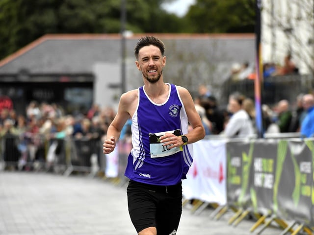 James Westerman, Foyle Valley AC, finishes in seventh place in the 2025 Waterside Half Marathon. Photo: George Sweeney