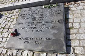 One of the memorial plaques at Auschwitz - Birkenau (Brendan McDaid/ Derry Journal)