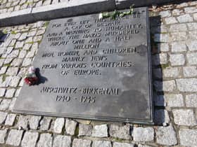 One of the memorial plaques at Auschwitz - Birkenau (Brendan McDaid/ Derry Journal)