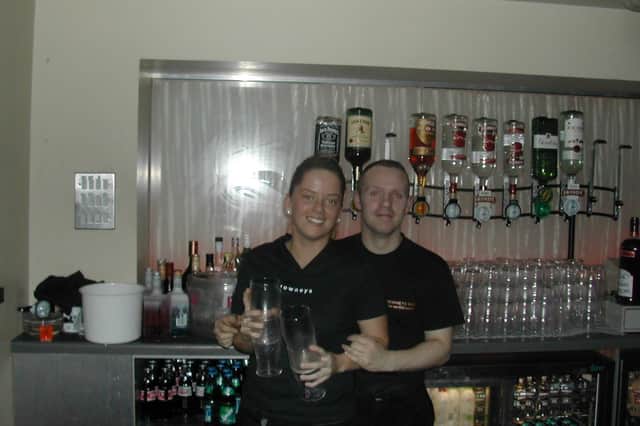What's yours? Bar staff at Downey's back in 2003.