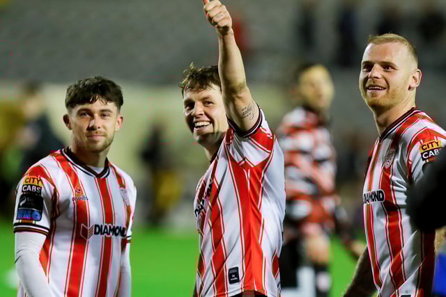 Ben Doherty, Adam O'Reilly and Mark Connolly enjoy the celebrations at Dalymount Park.