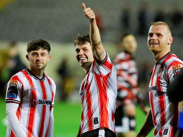 Ben Doherty, Adam O'Reilly and Mark Connolly enjoy the celebrations at Dalymount Park.
