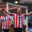 Hat-trick hero Liam Boyce celebrates in front of the Brandywell support as Derry City ran riot against Waterford. Photos by Kevin Moore.