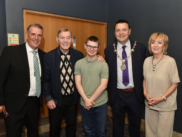 Martin Mullan (left) producer, Charlie Nash, Conan Norris and Betty Nash pictured with Mayor Ruairí McHugh at the opening night of the Grove Theatre Group's production of Annie at the Millennium Forum on Wednesday. Photo: George Sweeney