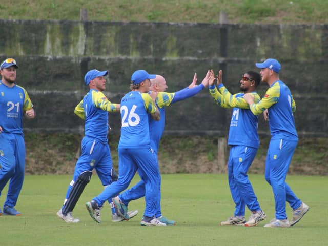 Donemana celebrate a wicket in Sunday's cup tie. (Photo: Lawrence Moore)