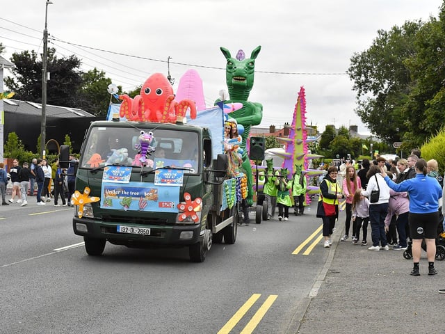 Muff Feile opening parade makes its way through the village on Friday evening. Photo: George Sweeney