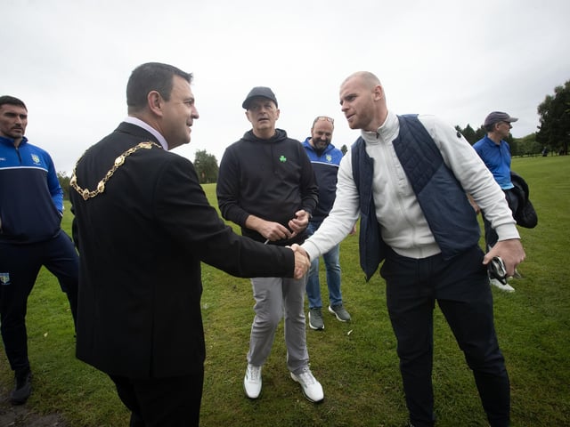 The Mayor Ruairi McHugh is introduced to Derry City captain Mark Connolly by Hollybush's Andy McDermott.