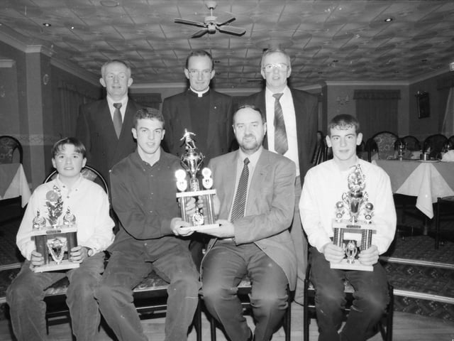 At the Clonmany Shamrocks presentation. Seated, from left, Philip Devlin (Reserve Player of the Year), Herbie Barr, league secretary, Sean Devlin (Player of the Year) and John McCarron (Clubman of the Year). Standing, from left, Charlie Doherty, secretary, Fr. Noel McDermott and Sean McDaid, chair.
