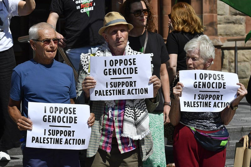 Veteran Civil and Human Rights campaigners Willie White and James and Diana King at the Defend the Right to Protest Rally held in Guildhall Square on Saturday afternoon. Photo: George Sweeney