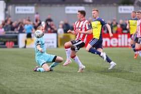 Shelbourne keeper Conor Kearns gets a strong hand to the ball to deny Ben Doherty in the first half.