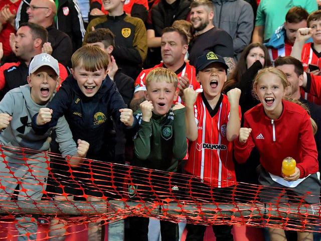 Fans celebrate Derry City’s win over KuPs at the Brandywell. Photo: George Sweeney.DER2330GS -