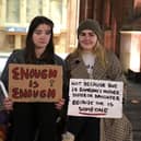 Women carry placards at the Alliance for Choice Derry rally held at Guildhall square on Friday evening in a protest at violence against women and girls following the recently reported rape of a woman in the city. Photo: George Sweeney