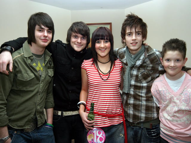 Bronagh smiles for the camera with, John, Colin, Blaine and ciaran 0169JML : Parties and celebrations January 2006: Bronagh Halpenny.