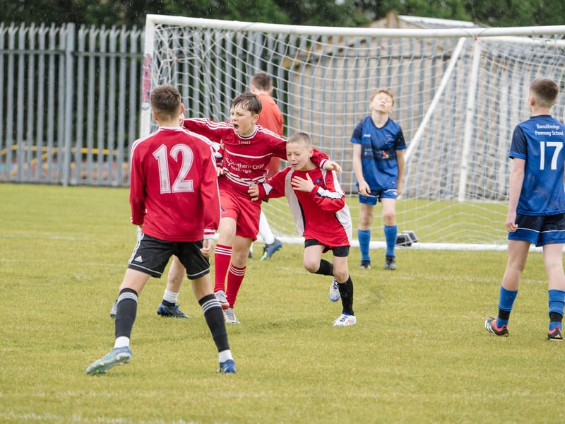 St. Anne's PS players celebrate the opening goal in the Sean O'Kane Cup final against Broadbridge on Thursday last at St. Joseph's Boys School. (Photos: Jim McCafferty Photography)