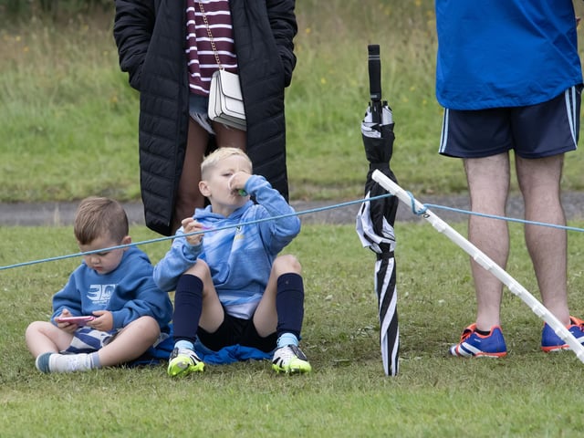 This young player gets some refreshments in between games.