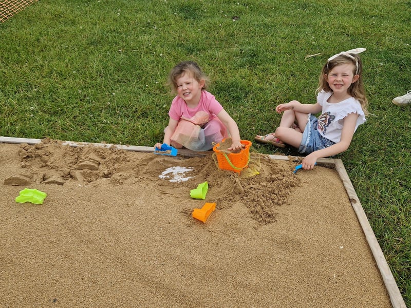 Clara and Jolene Jackson from Redcastle, having fun in the children's play area.