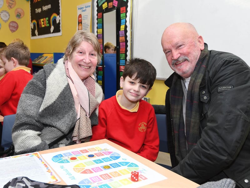 Young Arlo takes time out for a photo with his grandparents last week.