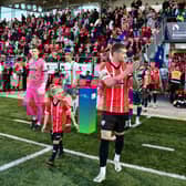 Derry City captain Patrick McEleney, pictured leading out the team, hopes the Brandywell support can lift the team to victory on Saturday.