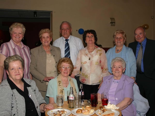Having a good time at the Anniversary party Left to right Nellie McGinley, Ruth McEleney, Peggy Feeny, Shelia and Seamus Bradley, Mary Mc Clenaghan, Angela Kelly, Peggy and Richard Devine having a good time. 5089dd : McClenagan.