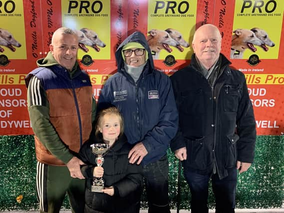 The Donnelly Family receiving the Brandywell Greyhound Supporters Group (BGSG) Trophy after 'Da Great Johnny' was voted our joint favourite performer at the November 7th meeting. From left; Gavin Donnelly, Freya Donnelly, Patsy Doyle (representing BGSG) and Roy Donnelly.