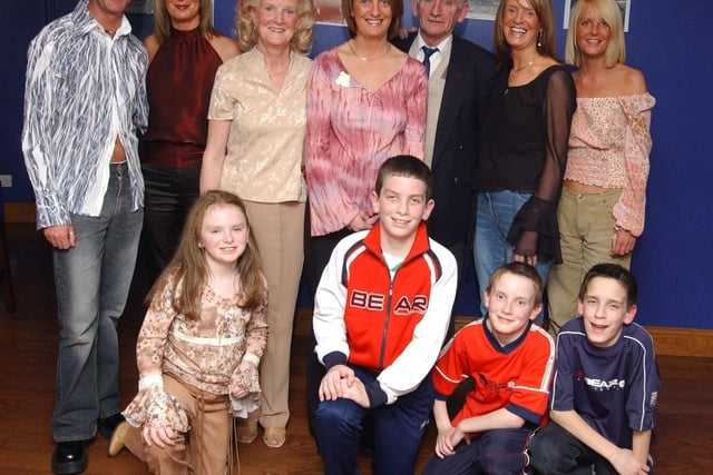 Donna Breslin with her husband Bill and the Neary family. Included are, Darren, Majella, Mary and Christopher, Donna's Mum and Dad, Caroline, Sandra, Gareth, Lauren, Aiden and Connor. celebrating Donna's 40th birthday at Pitcher's Bar.                                :Party snaps from 2003 by Hugh Gallagher
