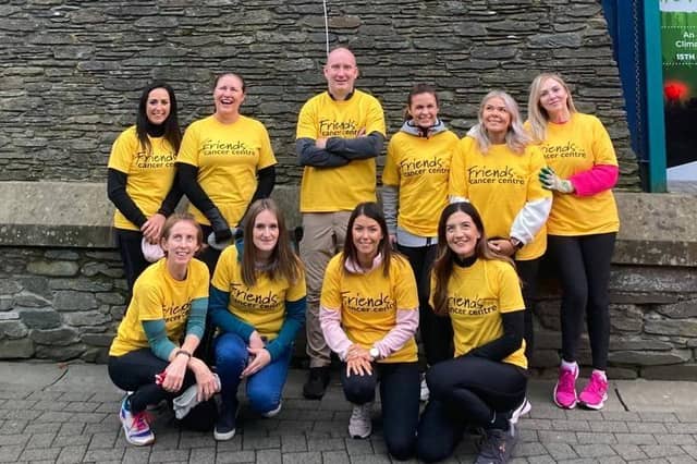 The ten brave workers from the North West Cancer Centre who abseiled the Tower Museum.