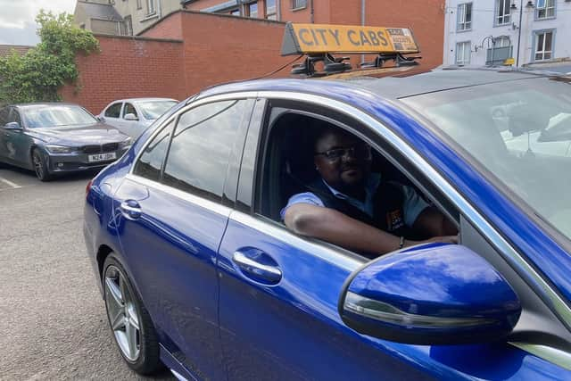 Obinna Okeagu, better known locally as Austin, who is from Nigeria. Obinna has been a taxi driver in Derry for four years and is thought to be the city’s first black African cabbie.