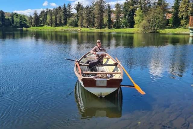 Angler enjoying fishing in Creggan Country park fishery.