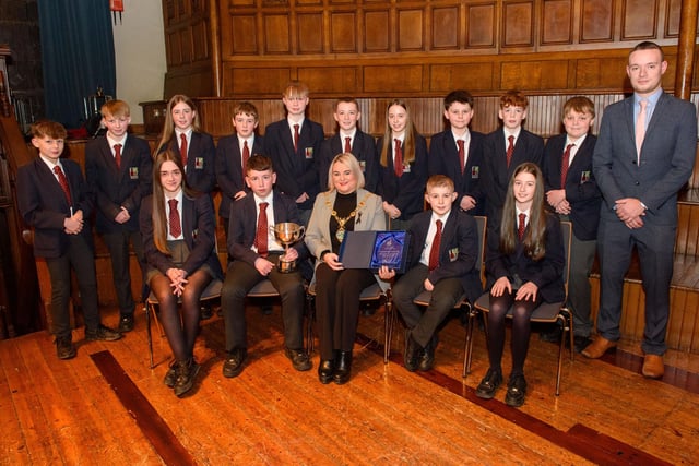 The Mayor Councillor Sandra Duffy welcomed pupils from Lisneal College to the Guildhall as she recognised the hugely successful cricket teams who claimed four trophies last season including the,  Under 12 Wesley Ferris Cup winning team and coach Craig Peters. Picture Martin McKeown. 26.01.23:.