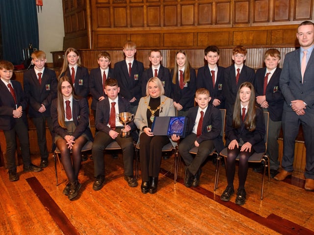 The Mayor Councillor Sandra Duffy welcomed pupils from Lisneal College to the Guildhall as she recognised the hugely successful cricket teams who claimed four trophies last season including the, Under 12 Wesley Ferris Cup winning team and coach Craig Peters. Picture Martin McKeown. 26.01.23:.