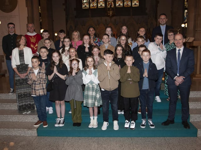 Pupils from Rosemount PS who received the Sacrament of Confirmation from Fr. Paul Farren at St. Eugene’s Cathedral on Friday last. Included is Mr. Paul Bradley, Principal, Mr. Quinn, teacher, Mrs. Stewart, Ms. Friars and Mr. Doherty. (Photo: Jim McCafferty Photography)