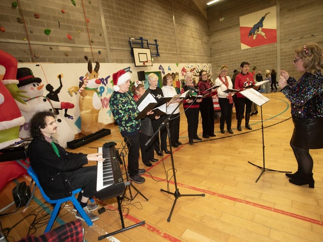 The Momentum Choir performing at Saturday's 'Christmas Get-Together'. : .
